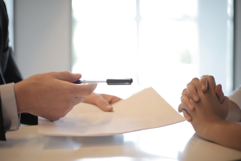 Close up of document review interview.